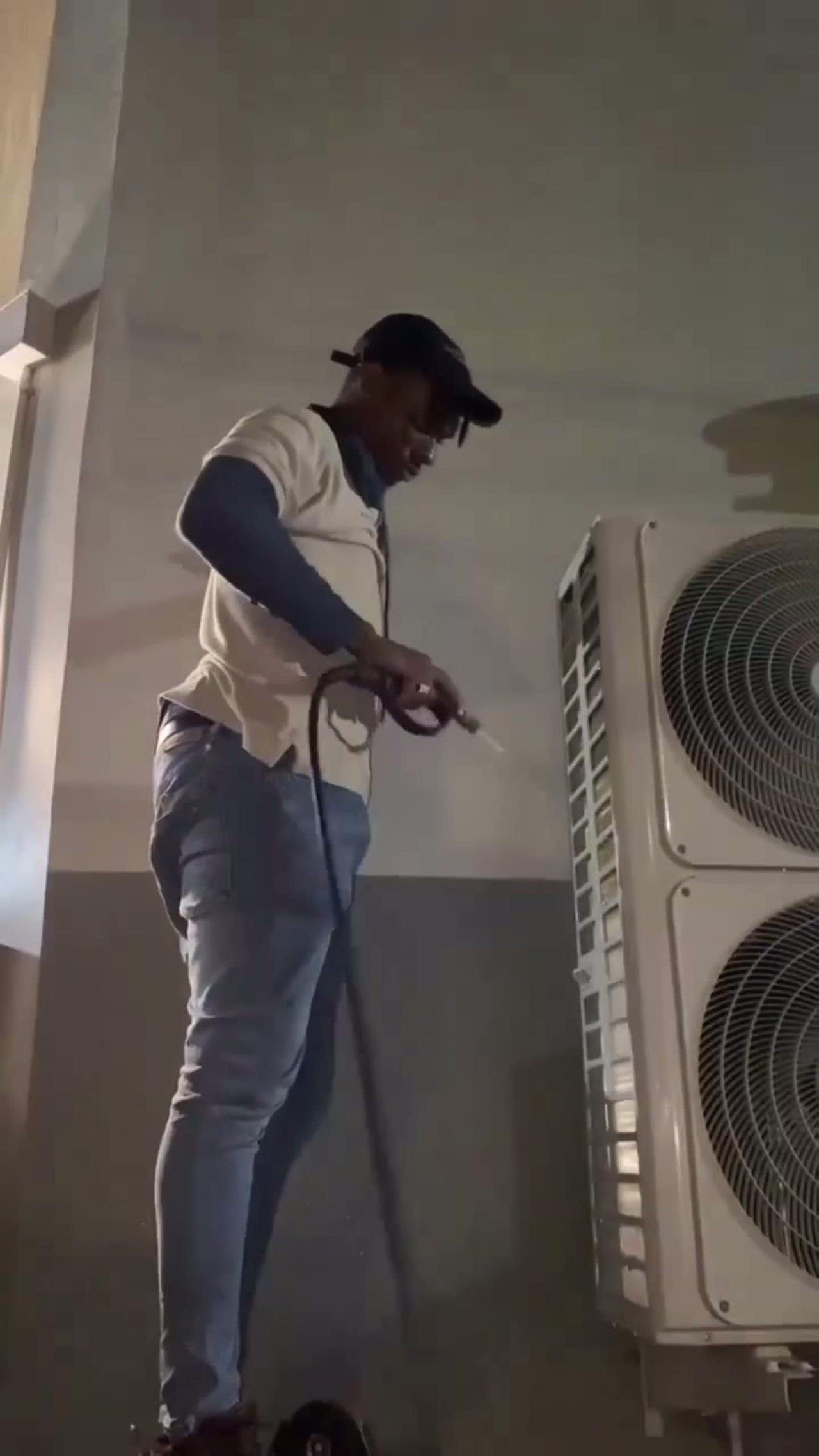 Outdoor unit being washed
